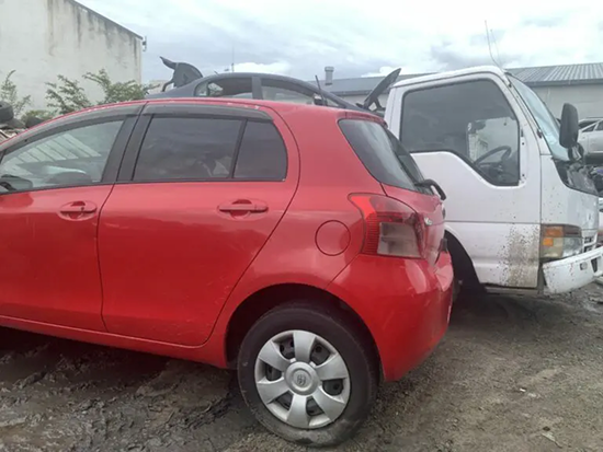 Scrap car loaded onto a truck in Tauranga